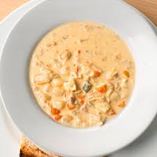Creamy Conch Chowder Served with Garlic Bread